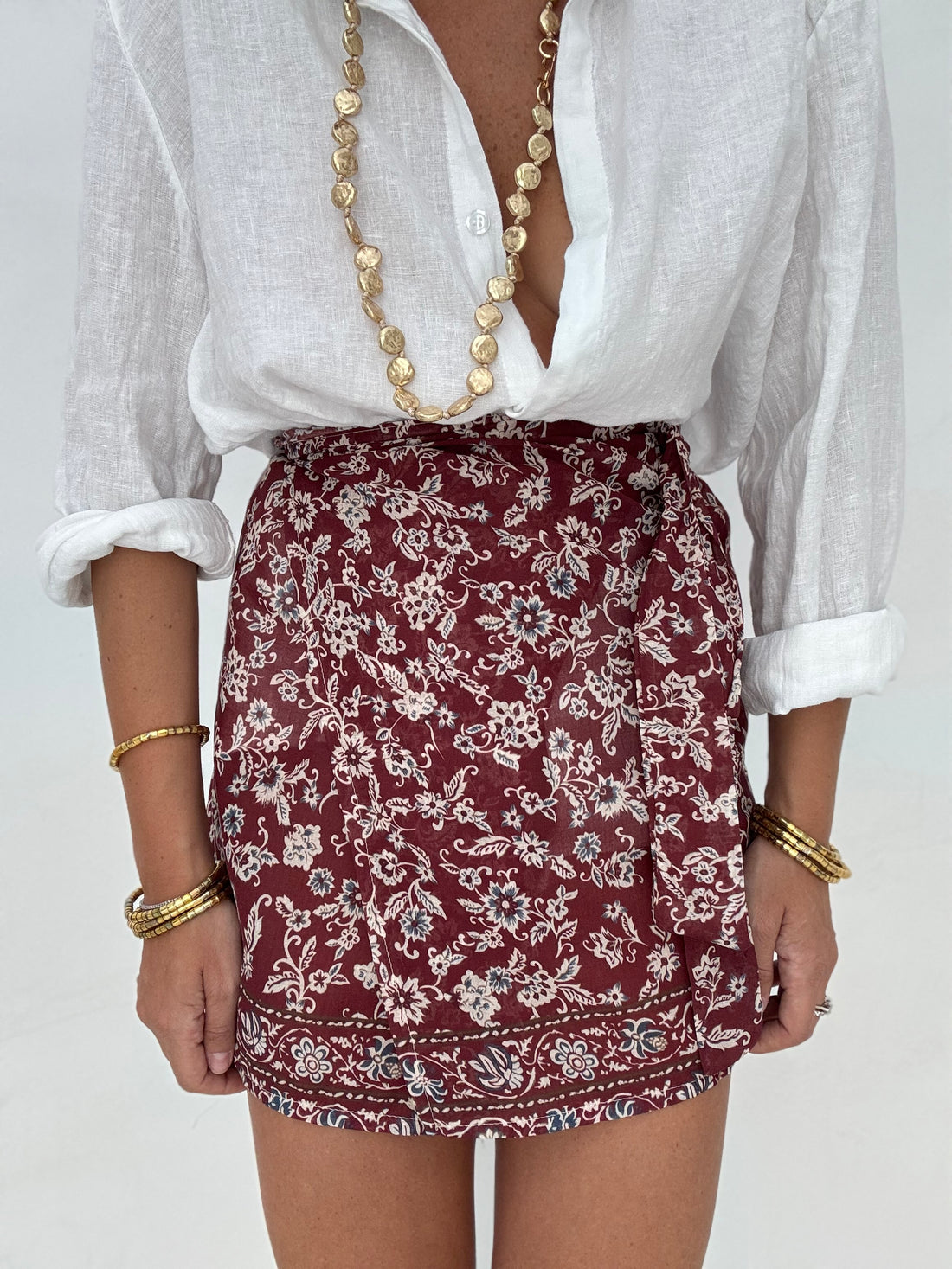 Gonna portafoglio con fiori base Bordeaux
