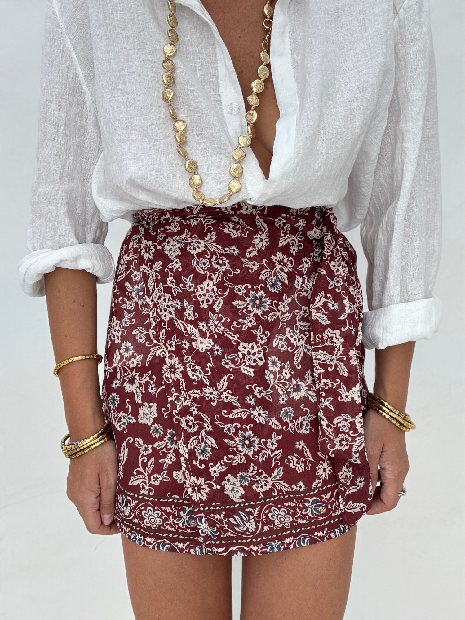 Gonna portafoglio con fiori base Bordeaux