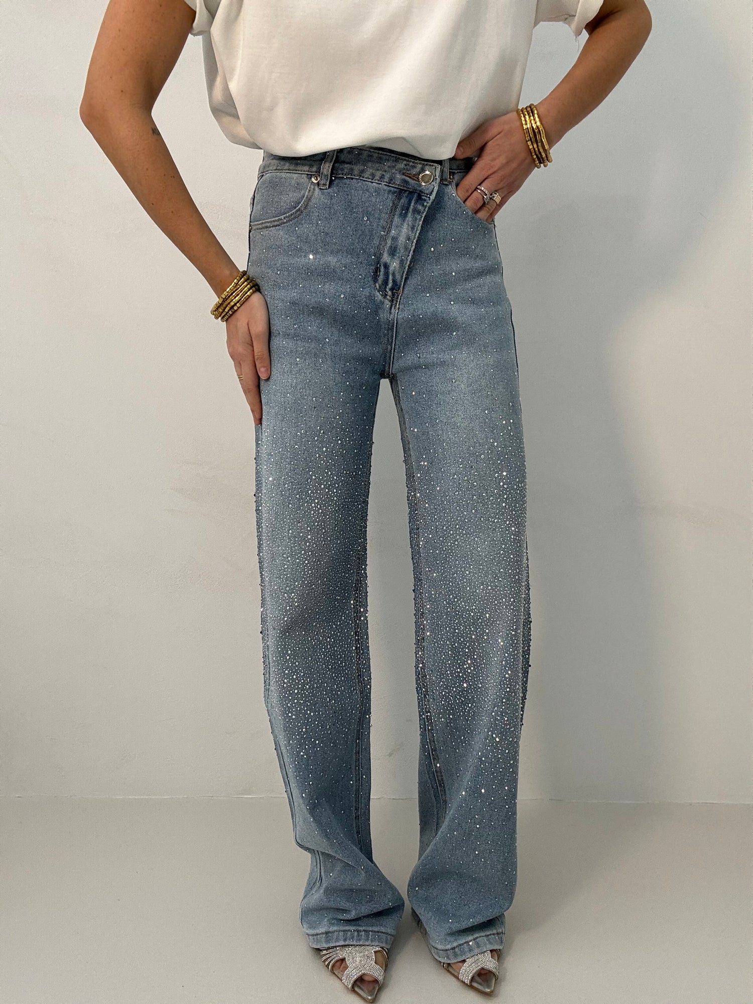 Jeans strass ‘BOTTONE ASIMMETRICO’ Denim Chiaro