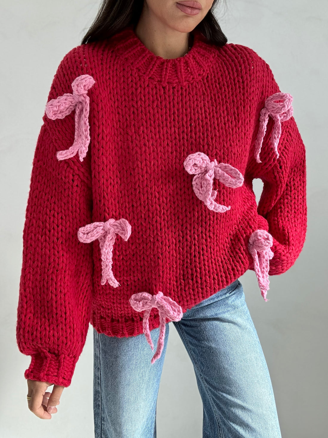 Maglione ‘UNCINETTO’ Rosso con fiocchi rosa