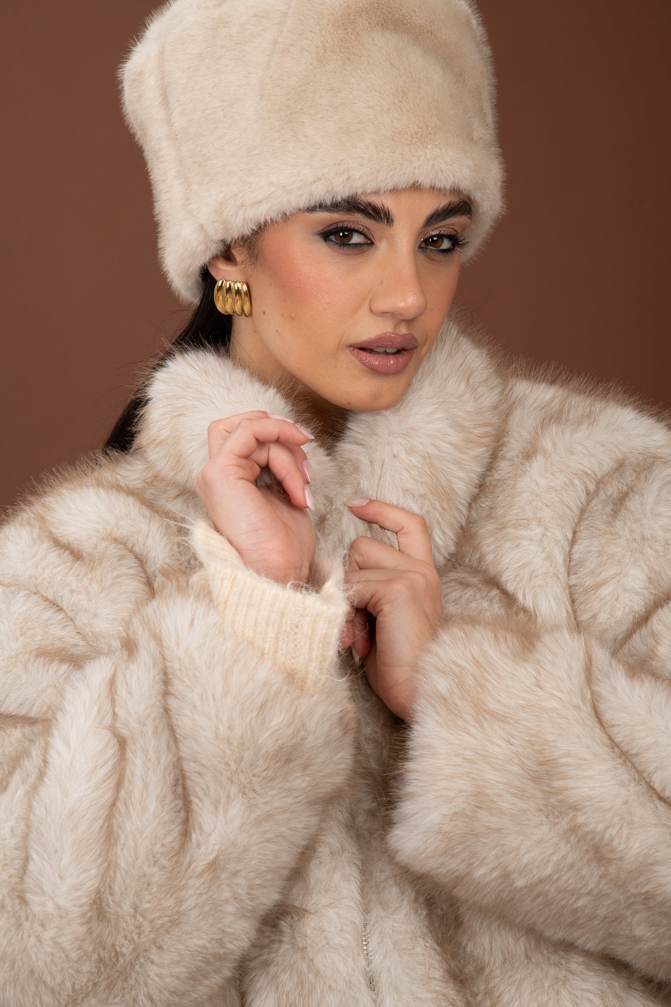 Cappello eco-pelliccia Panna