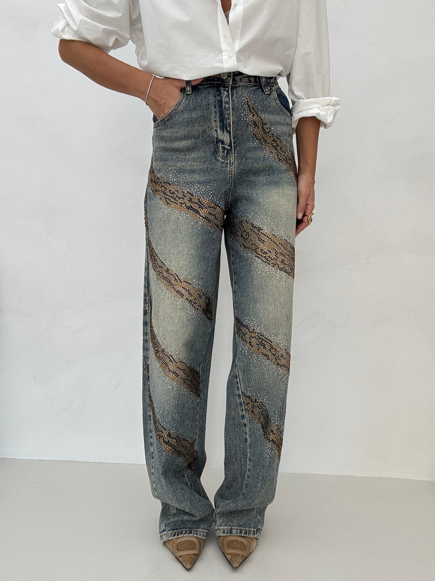 Jeans ‘BAGGY’ denim slavato con strass