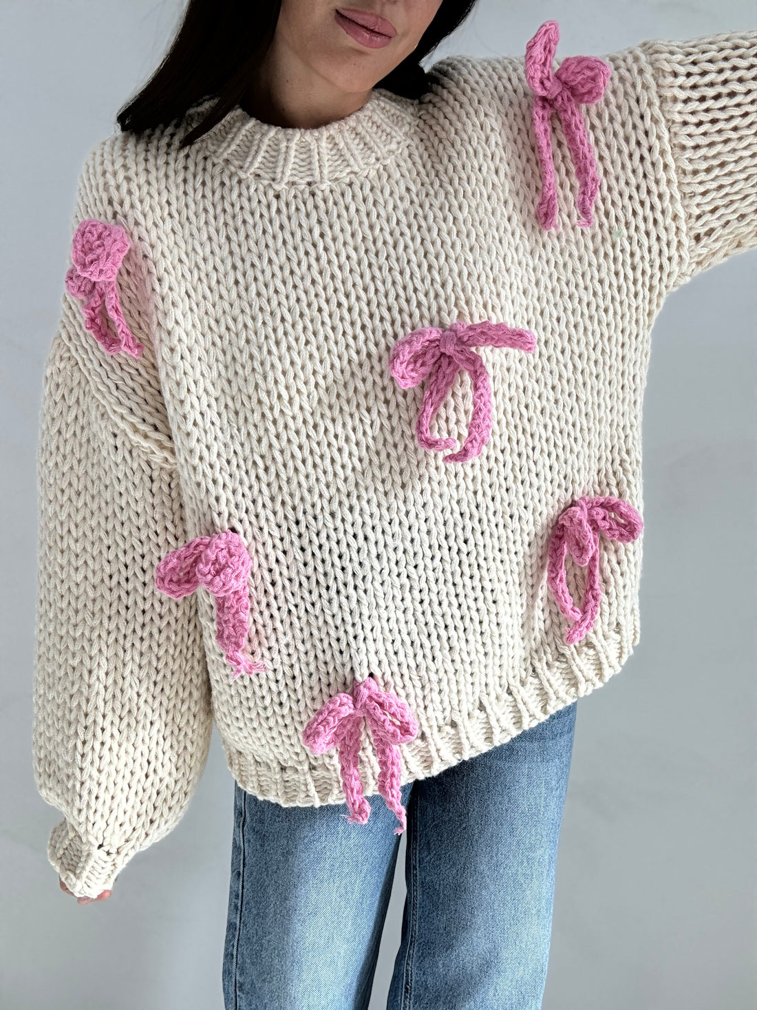 Maglione ‘UNCINETTO’ Panna con fiocchi rosa