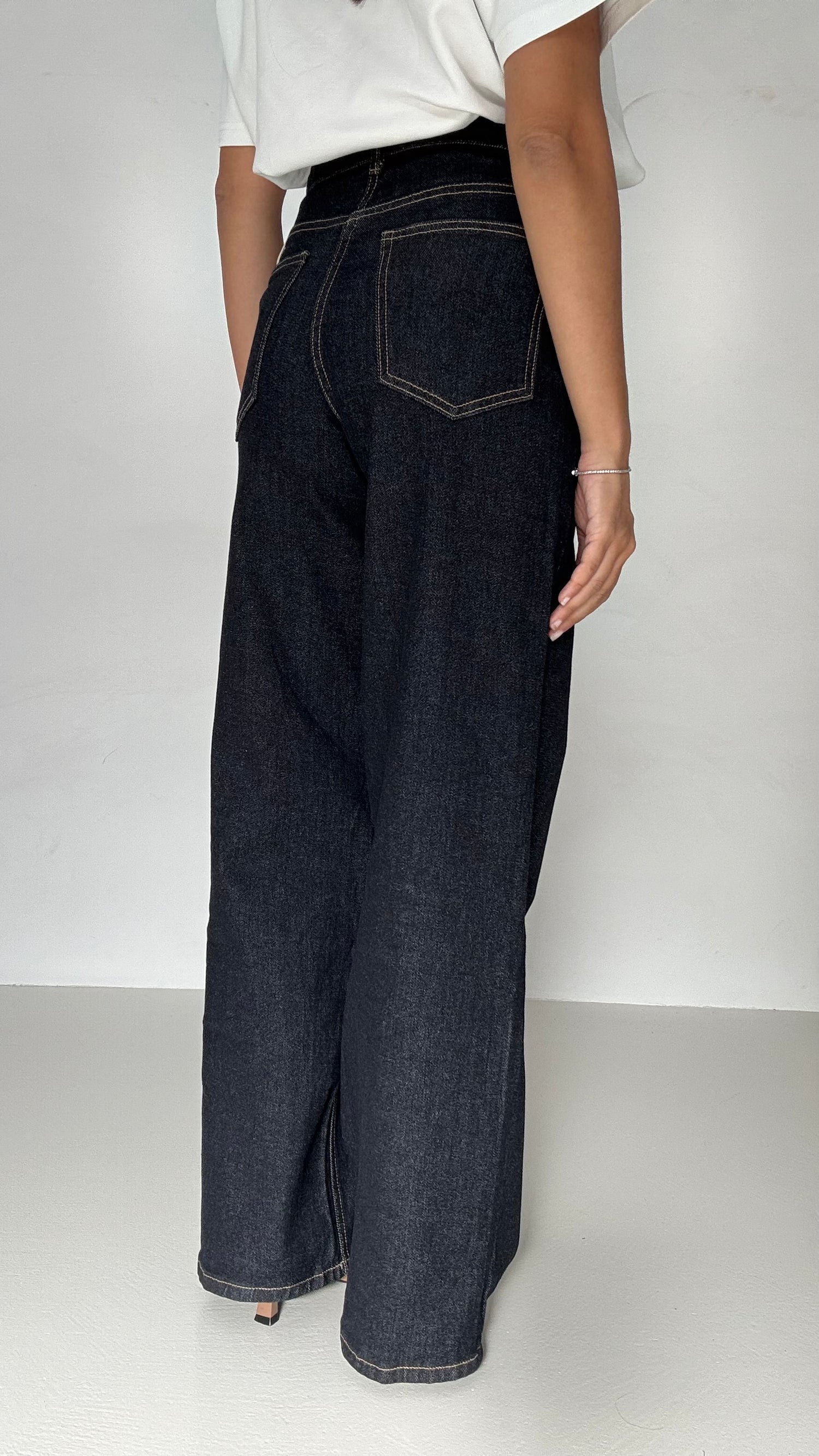 Jeans ‘BOTTONE ASIMMETRICO’ Lavaggio Zero
